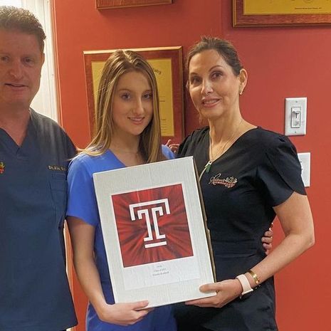Temple dentistry student Natasha Rockwell and her parents.