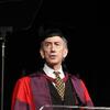 Photo of Dean Klein in regalia during graduation ceremony