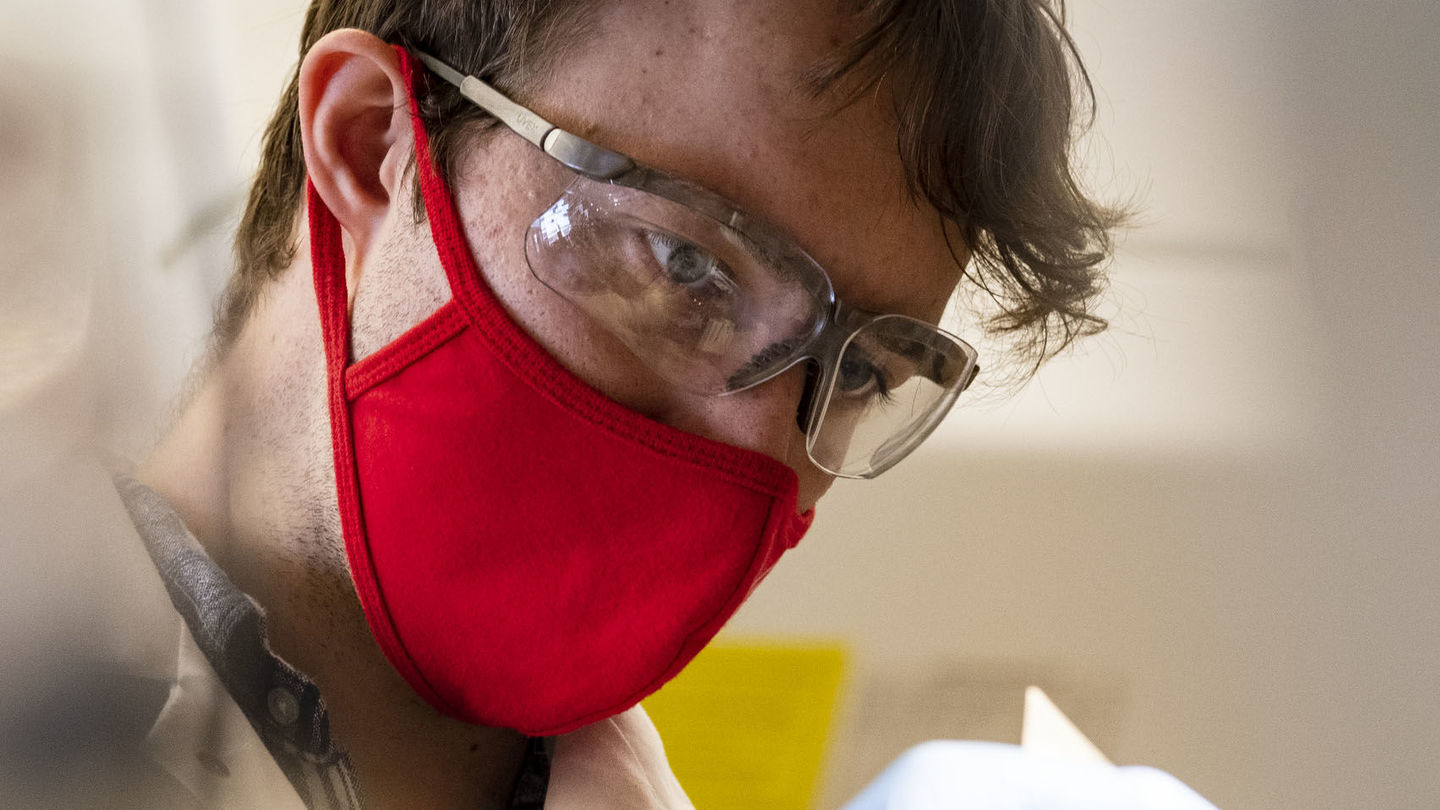 Chemistry students doing research in lab