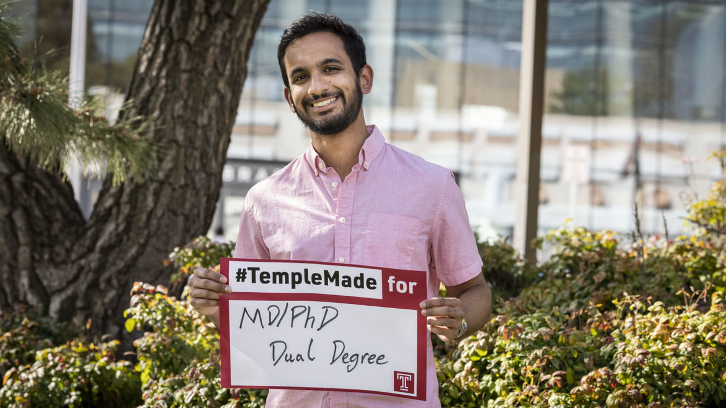 While at Temple, Dhruv Vajipayajula presented at conferences and the university’s Symposium for Undergraduate Research and Creativity. His work has been published in peer-reviewed journals and he was awarded the Thermo Fisher Scientific Antibody Scholarship for his research, scientific integrity and passion for innovation. Image of Temple student on Main Campus outside.